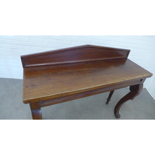 243 - Late 19th / early 20th century mahogany ledge back table, cabriole front legs,  112 x 130 x 45