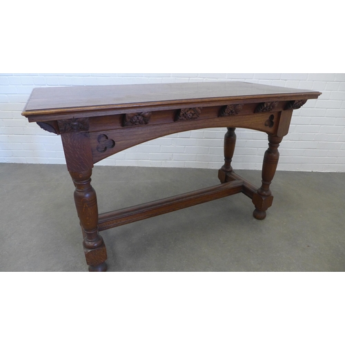 244 - Late 19th / early century gothic oak table, rectangular top with a moulded  edge, over an arched fri... 