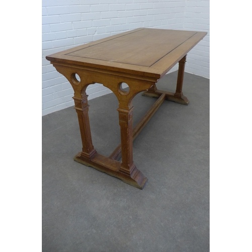 245 - Gothic Revival light oak table by Morison & Co Edinburgh, rectangular top on trestle end supports, u... 