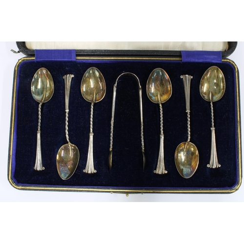 34 - Cased set of six silver teaspoons with matching sugar tongs, Birmingham 1945