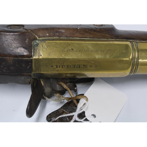 385 - 19th century blunderbuss pistol, brass barrel, lock plate indistinctly marked and barrel with person... 