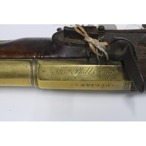 385 - 19th century blunderbuss pistol, brass barrel, lock plate indistinctly marked and barrel with person... 