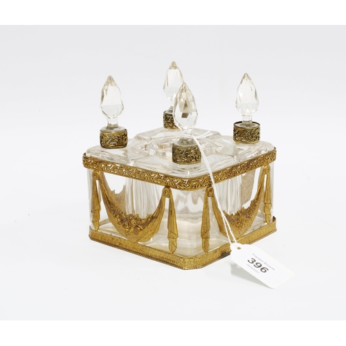 396 - 19th century scent bottle stand, likely French, four bottles with metal collars & cut glass stoppers... 