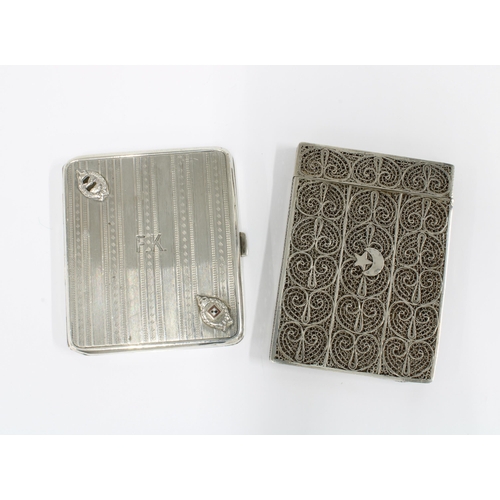 41 - Scandinavian silver cigarette case, circa 1930, stamped 935 together with a filigree white metal car... 