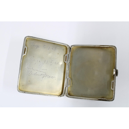 41 - Scandinavian silver cigarette case, circa 1930, stamped 935 together with a filigree white metal car... 