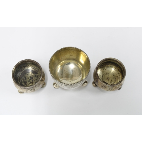 43 - Pairi of russian silver salts and a Victorian Sheffield silver salt, 3cm diameter, (3)