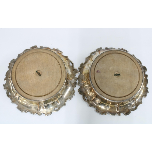 51 - A pair of Sheffield plate wine coasters, Henry Wilkinson, with turned wood bases and fruit and vine ... 