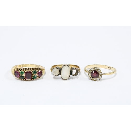 67 - 15ct gold ruby and emerald ring, 9ct gold ruby and seed pearl ring and an 18ct gold ring with one st... 