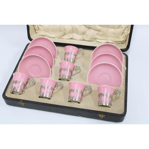 75 - George V Aynsley silver-mounted demitasse coffee set, decorated in gilt and pink, London 1920, in fi... 