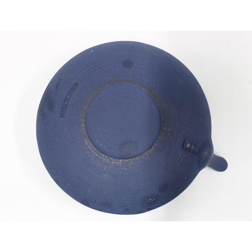 85 - Japanese cast iron teapot, blue with dimpled body and separate circuitry stand (2) 22cm.