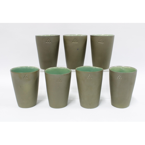 92 - Set of seven studio pottery beskers, sage matt glaze exterior with gloss interiors, (7) 12cm.