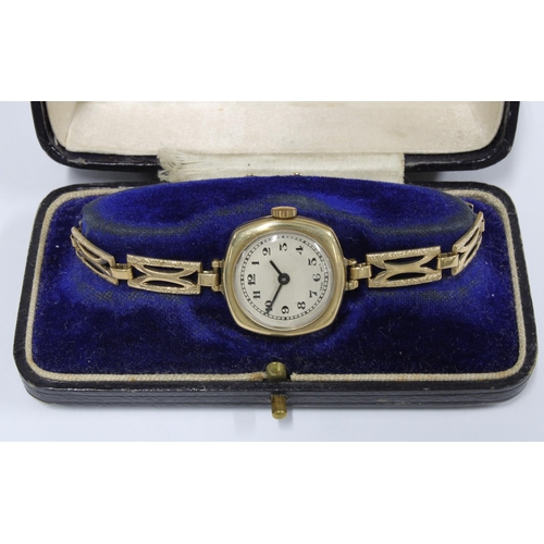 11 - Early 20th century lady's 9ct gold wristwatch on a 9ct gold bracelet strap, with original James Ritc... 