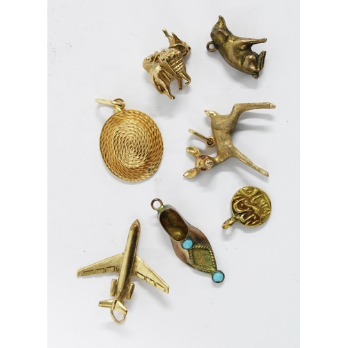 14 - 18ct gold hat charm, three 9ct gold charms to include an aeroplane, deer with gemset eyes and a donk... 
