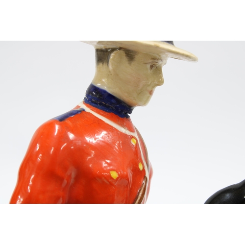 121 - Beswick figure of a Canadian Mountie on horse, a/f with restoration of a neck break, 21cm