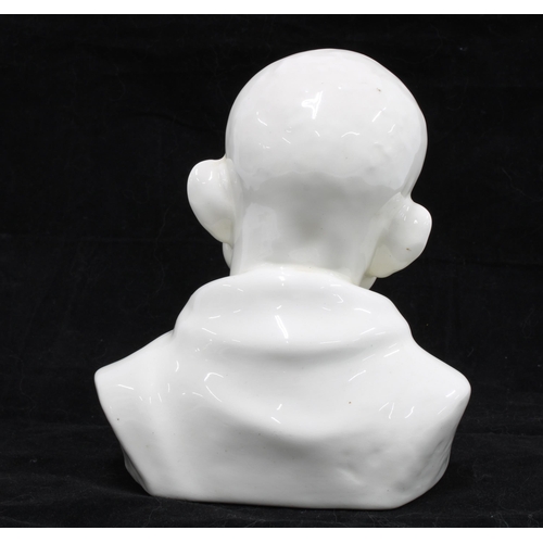 123 - White glazed pottery bust of Mahatma Gandhi, 14cm