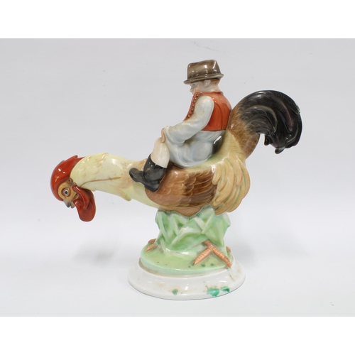 134 - Herend figure of a boy riding a rooster, 28cm