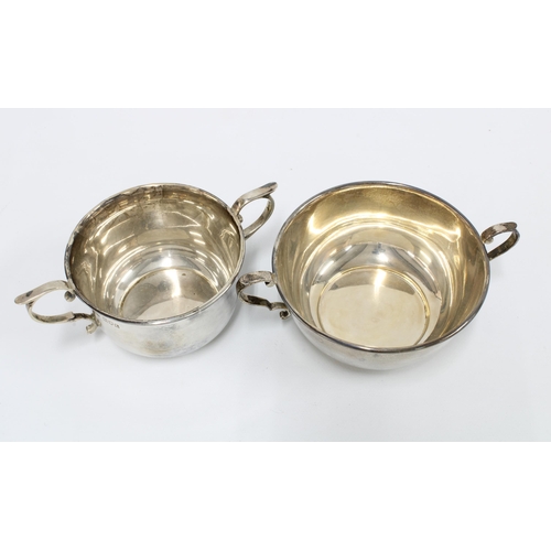 15 - George V silver twin handled bowl, London 1914, 11cm diameter,  and another silver bowl by  by James... 