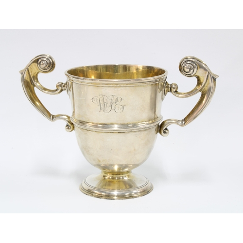 19 - Victorian silver gilt twin handled trophy cup, London 1899, engraved 'October 1851 - 1901', 14cm x 2... 