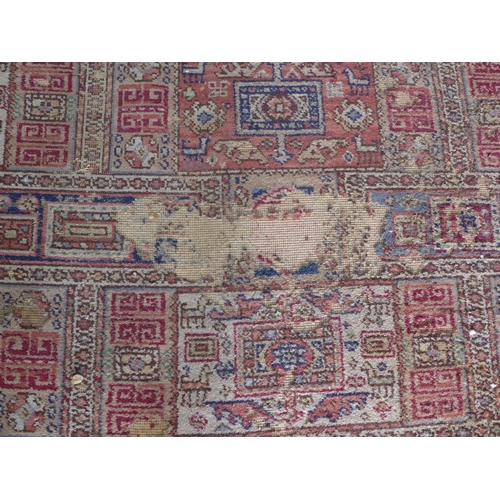 200 - Large Eastern carpet, pink field with allover pattern of square panels within flowerhead borders, ev... 