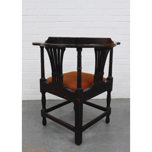 203 - A mahogany corner chair with double pierced splat back, upholstered slip in seat, raised on baluster... 