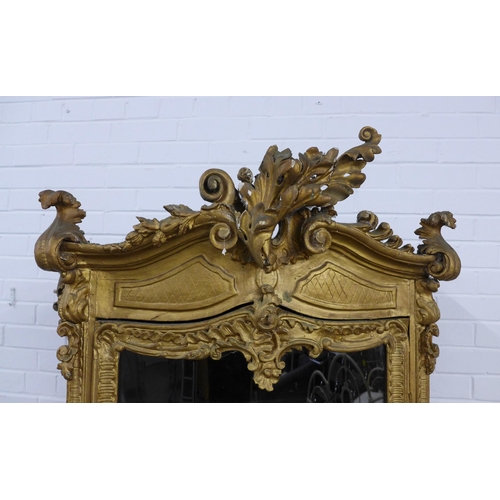 204 - Gilt wood glazed cabinet, Italianate in style, with rococo surmount and mouldings, front door is gla... 