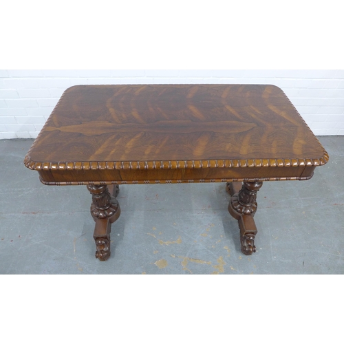 205 - 19th century rosewood table, the rectangular top with gadrooned edge, over two short frieze drawers,... 