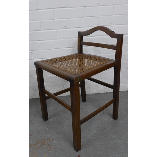 208 - Pair of oak low chairs with canework seats together with a matching stool. 62 x 40 x 37cm. (3)