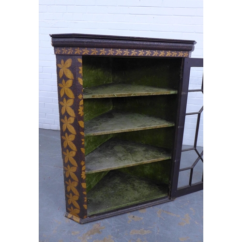 209 - A late 19th / early 20th century pokerwork glazed corner cabinet opening to reveal a green velvet sh... 