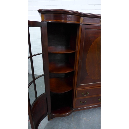 211 - Mahogany and inlaid display cabinet, inverted top over a central cupboard door and two short drawers... 