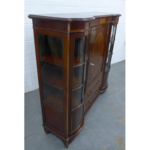 211 - Mahogany and inlaid display cabinet, inverted top over a central cupboard door and two short drawers... 