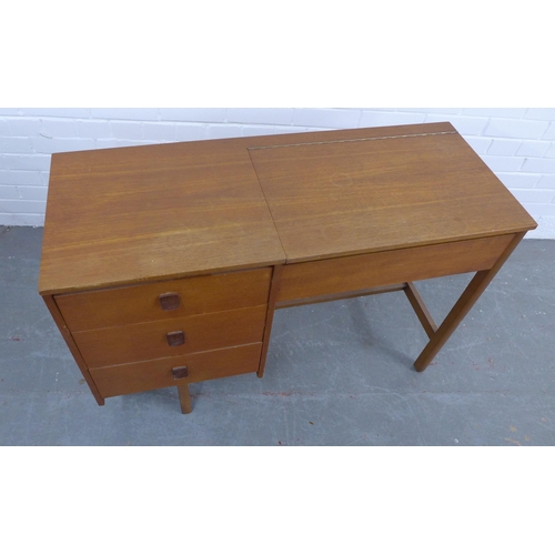 221 - Symbol Furniture - teak dressing table, with three short drawers and a lift up top and internal mirr... 