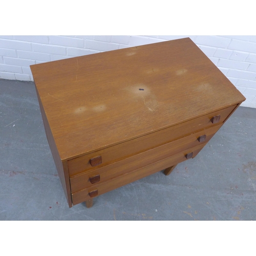 222 - Symbol Furniture - teak chest, the rectangular top over three long drawers . 72 x 76 x 42cm.