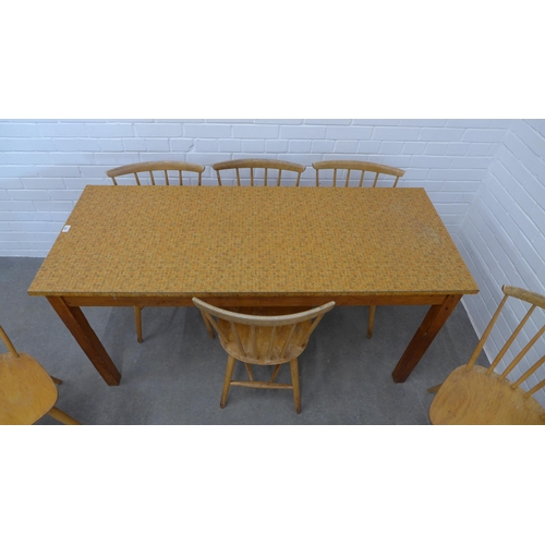 235 - Frank Guille for Kandya, a set of six spindle back chairs., together with a vintage kitchen table wi... 