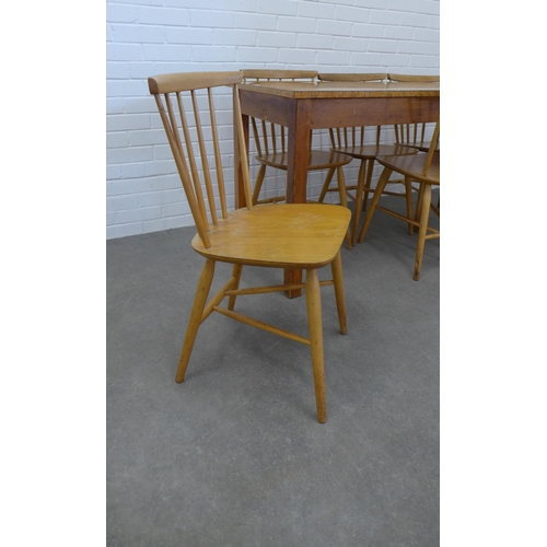 235 - Frank Guille for Kandya, a set of six spindle back chairs., together with a vintage kitchen table wi... 