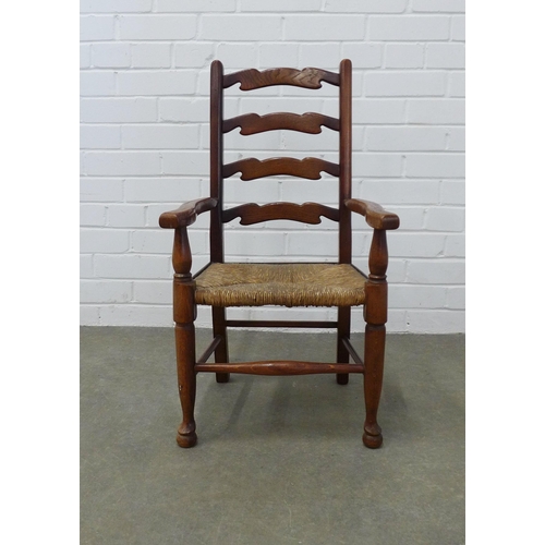 237 - A child's elm ladder back Lancashire style open armchair. 76 x 43 x 30cm.