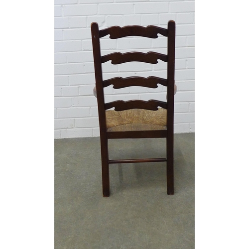 237 - A child's elm ladder back Lancashire style open armchair. 76 x 43 x 30cm.