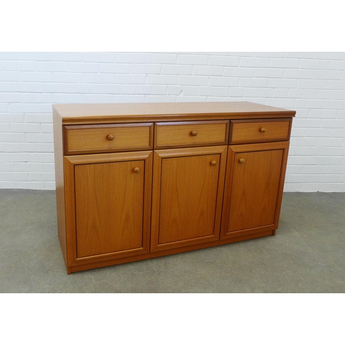 246 - Teak sideboard, three short drawers and three panelled doors, 77 x 124 x 45cm.