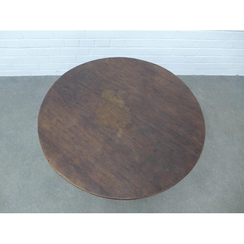 260 - 19th century tilt top table, circular top (split) on tripod legs and pad feet,  49 x 82 x 80cm.