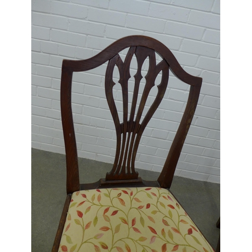 266 - Two Georgian oak splat back side chairs with slip in seats, 98 x 49 x 43cm. (2)