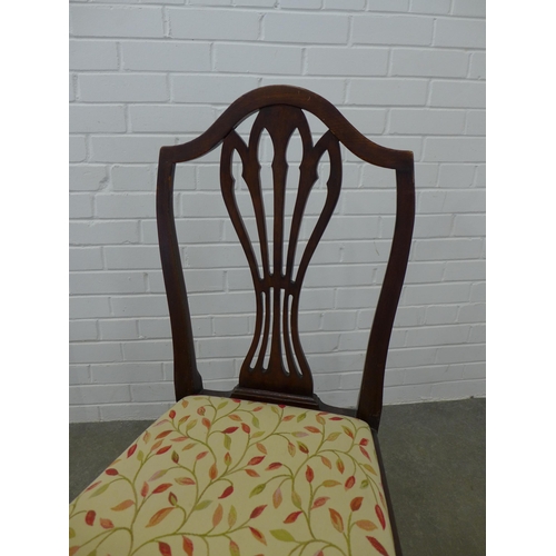 266 - Two Georgian oak splat back side chairs with slip in seats, 98 x 49 x 43cm. (2)