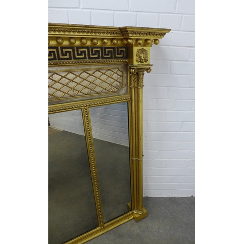 268 - An impressive NeoClassical style giltwood overmantle mirror, inverted breakfront with acanthus and s... 