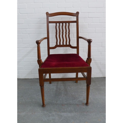 271 - An Arts & Crafts oak open armchair with red upholstered seat, 106 x 58 x 47cm.