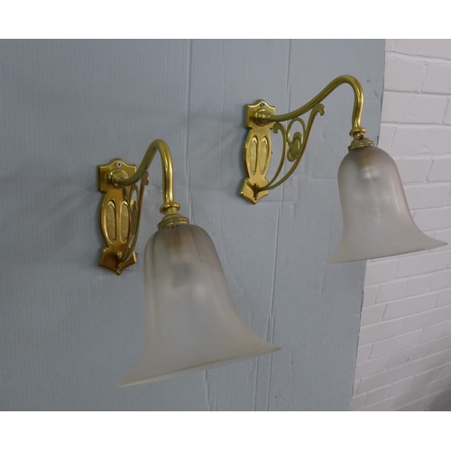 281 - A pair of Art Nouveau style brass wall lights with opaque glass shades (2)