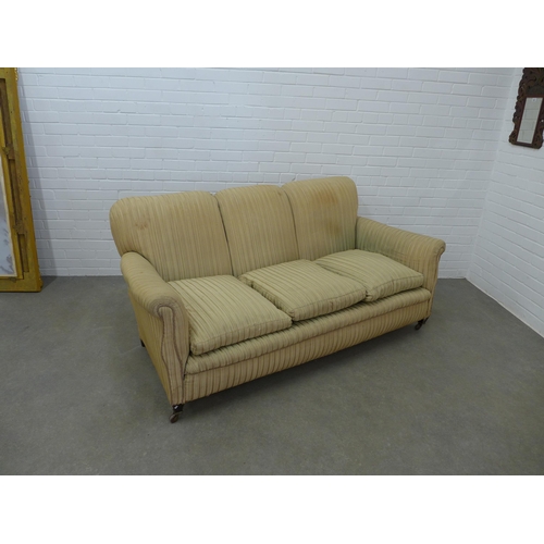 291 - Country House, Howard style  three seater sofa / settee with scroll arms and striped upholstery, wit... 