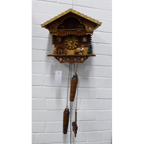 297 - Cuckoo style wall clock, 28 x 26cm.