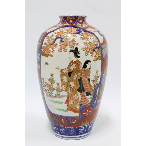 312 - Imari vase typically decorated with figures blossom and foliage, etc 30cm.