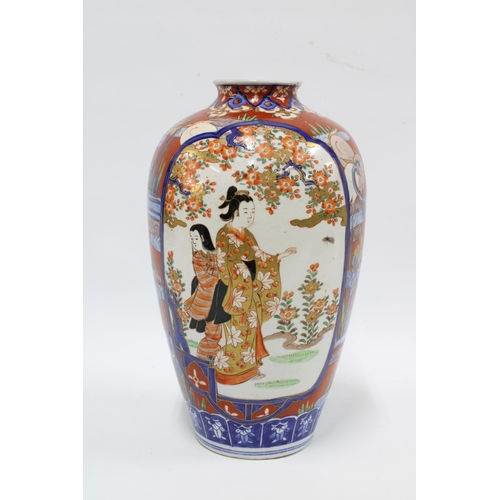 312 - Imari vase typically decorated with figures blossom and foliage, etc 30cm.