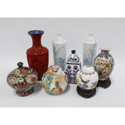 319 - A collection of Chinese and Japanese vases to include a pair of Japanese blue and white porcelain va... 