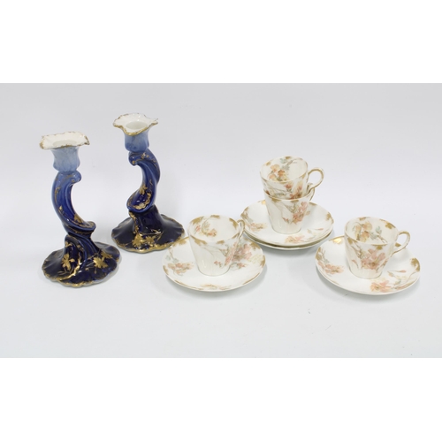 322 - Limoges porcelain cups and saucers and a pair of blue glazed candlesticks (a lot)