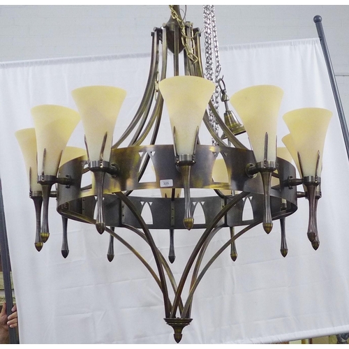 325 - Chelsom bronze patinated chandelier, circular frame with twelve sconce arms with fluted glass shades... 